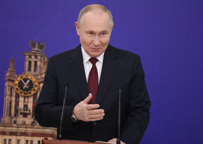 путін